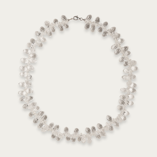 Glint Necklace with faceted 13mm clear crystals, 16-inch length, sterling silver lobster clasp, designed for dynamic light reflection.