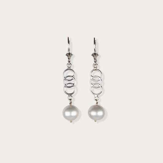 Sway Earrings in 14k white gold with freshwater pearls suspended from open links, 1.75-inch drop, fishhook ear wires.