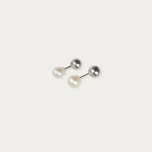 Barbell Earrings with 5mm freshwater pearls on one end and polished sterling silver spheres on the other, push-fit closure.