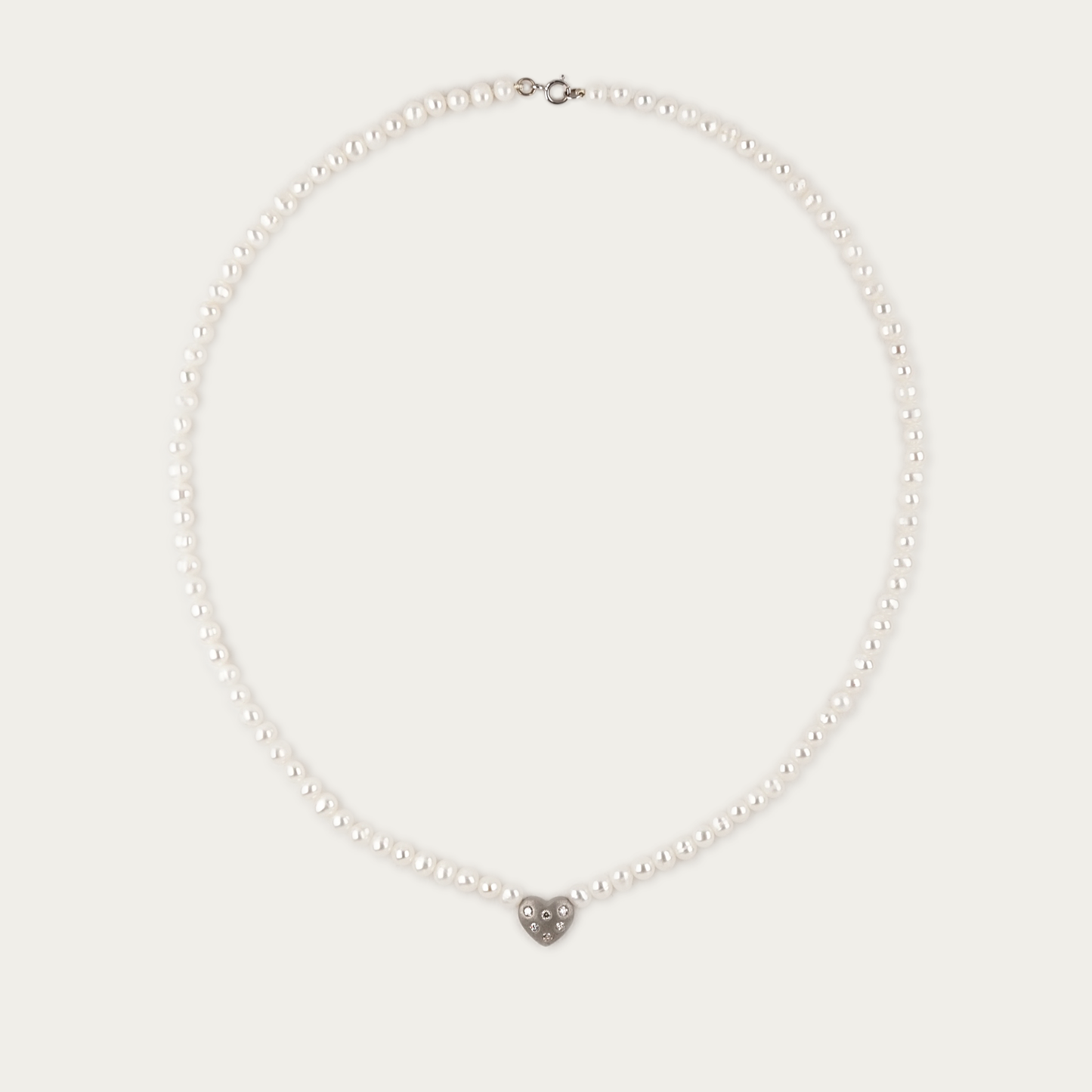 Amora Necklace with 5mm freshwater pearls and matte-finished heart charm set with six diamonds, 17-inch length, 14k white gold chain with spring ring clasp.