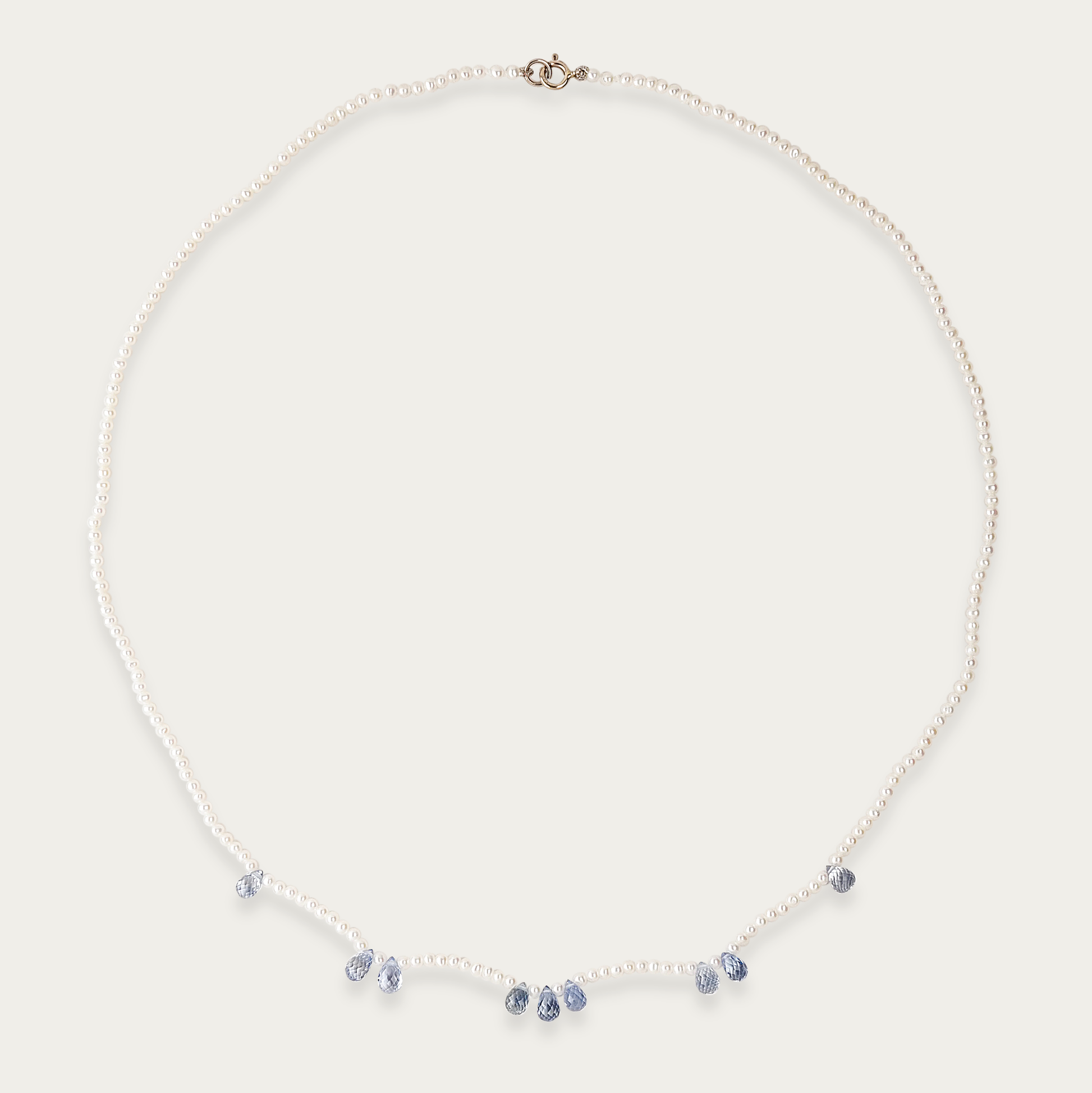 Azure Necklace with 1.5mm freshwater pearls and nine 5mm faceted blue sapphires, 16-inch length, 14k white gold spring ring clasp.
