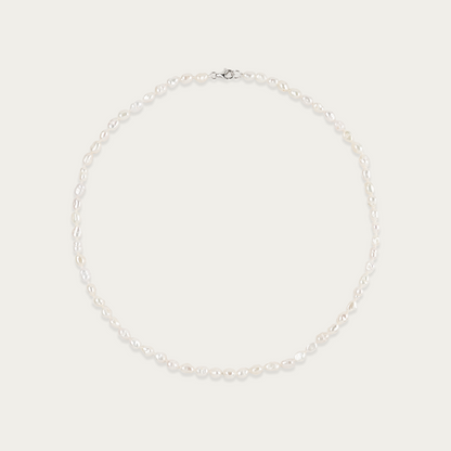Short Grain Necklace with lustrous, rice-shaped freshwater pearls, 16-inch length, sterling silver clasp, irregular by design.