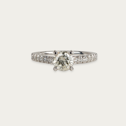 Lumen ring in 18k white gold with 0.60ct round brilliant center diamond, J-K color, I2 clarity, pavé side diamonds totaling 0.15ct, size 6.