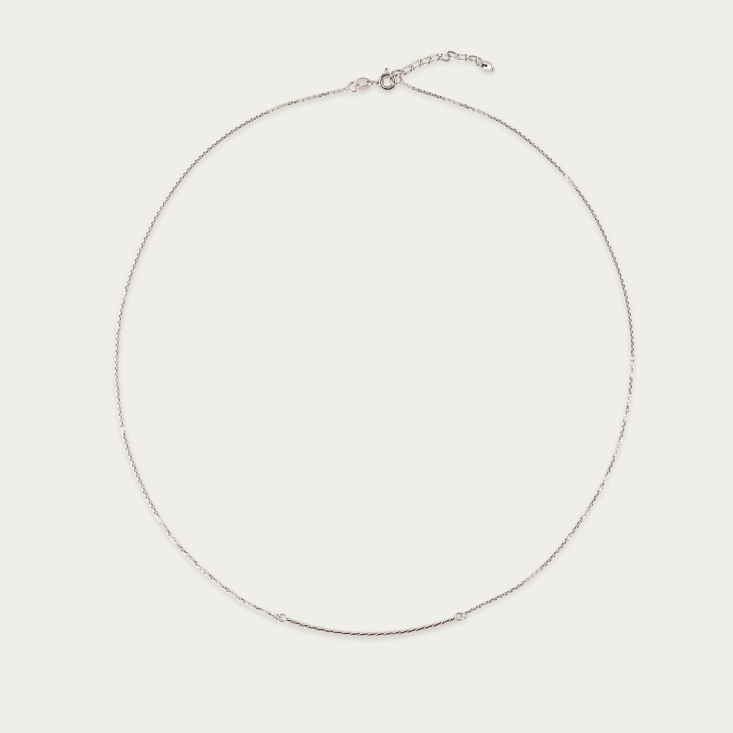 Glide Necklace with polished curved bar in 10k white gold, 17-inch chain with spring ring closure, diamond illusion finish.
